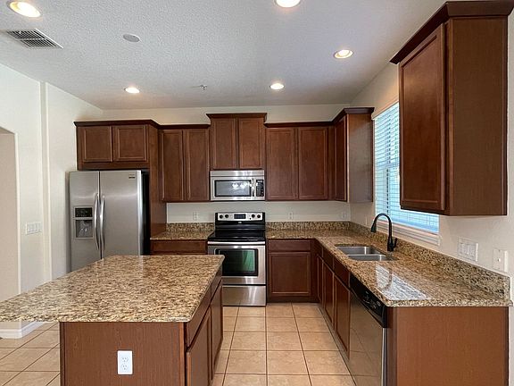 4th image of 9484 Strongbark Ln