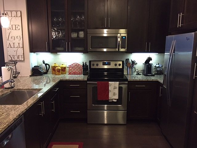 Large kitchen with stainless steel appliances