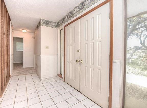 This big, double door entry may not look like much now, but it could be a real show stopper! 2 side 