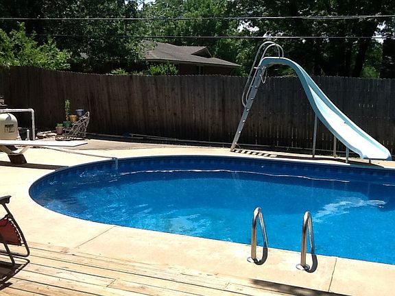Pool with diving board/slide