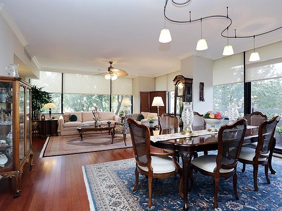 SPACIOUS OPEN AREA FROM THE DINING ROOM LOOKING TOWARD THE LIVING ROOM.