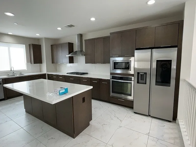 2nd floor - Great room - Kitchen, living room, under-stair storage, bathroom, balcony/patio