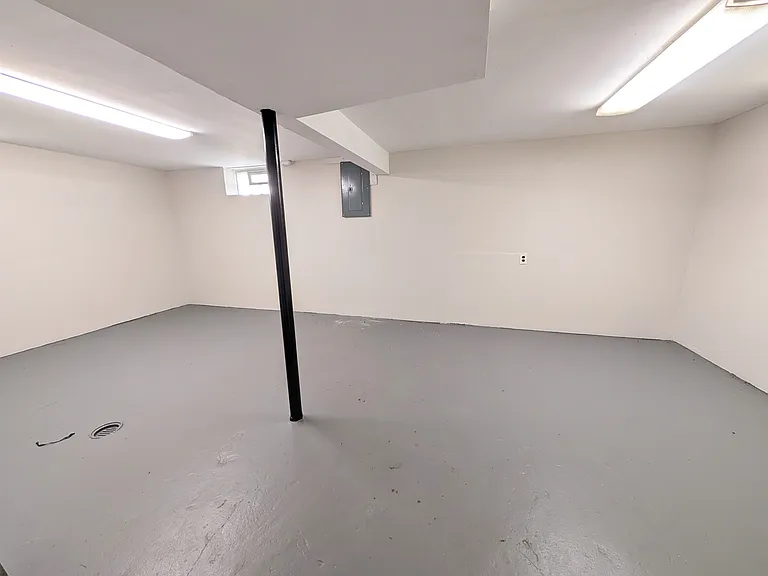 Massive room in the basement great for storage, a playroom, a second living room, etc.