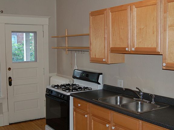 Kitchen - back door leading to small balcony. Appliances will be updated before move-in (see following pictures)