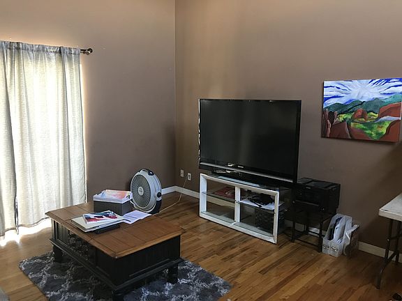 living area w/ wood floor