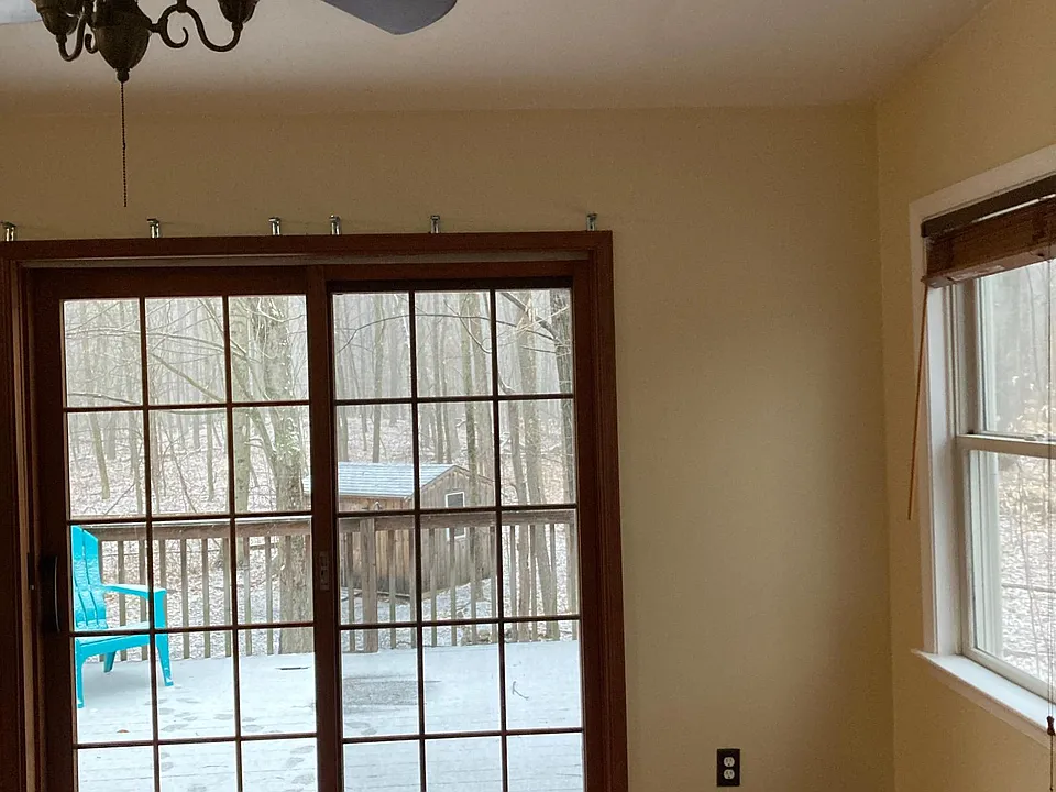 Dinging room with deck and back yard shed