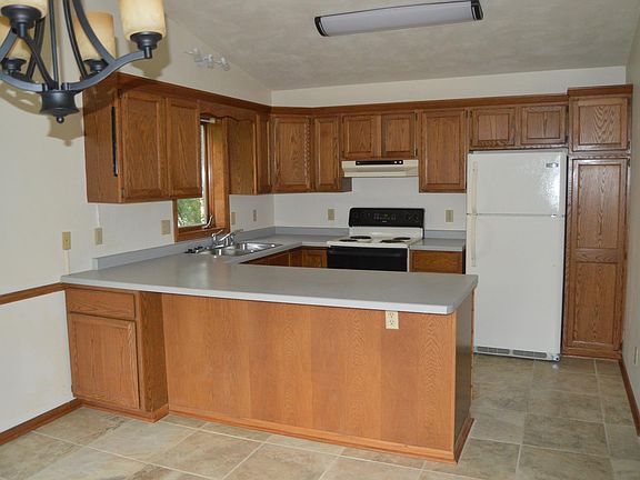 Kitchen and dining area with newer appliances