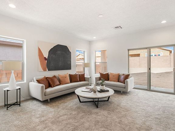 Gathering room is light and bright with overhead recessed lighting and windows