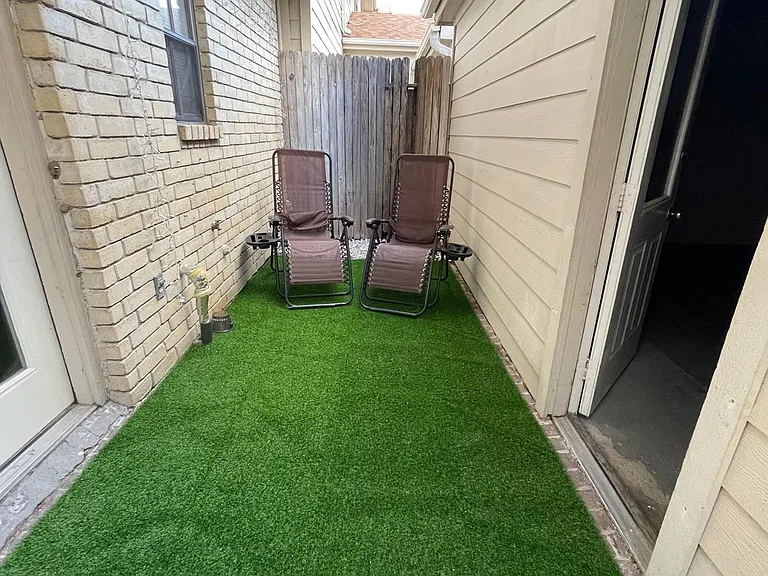 Patio with green truf. with or with chairs