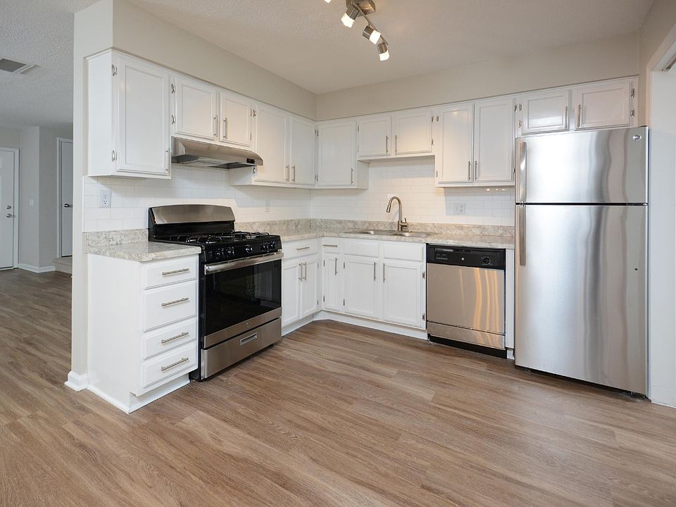 Upgraded sleek kitchen with stainless steel appliance packag