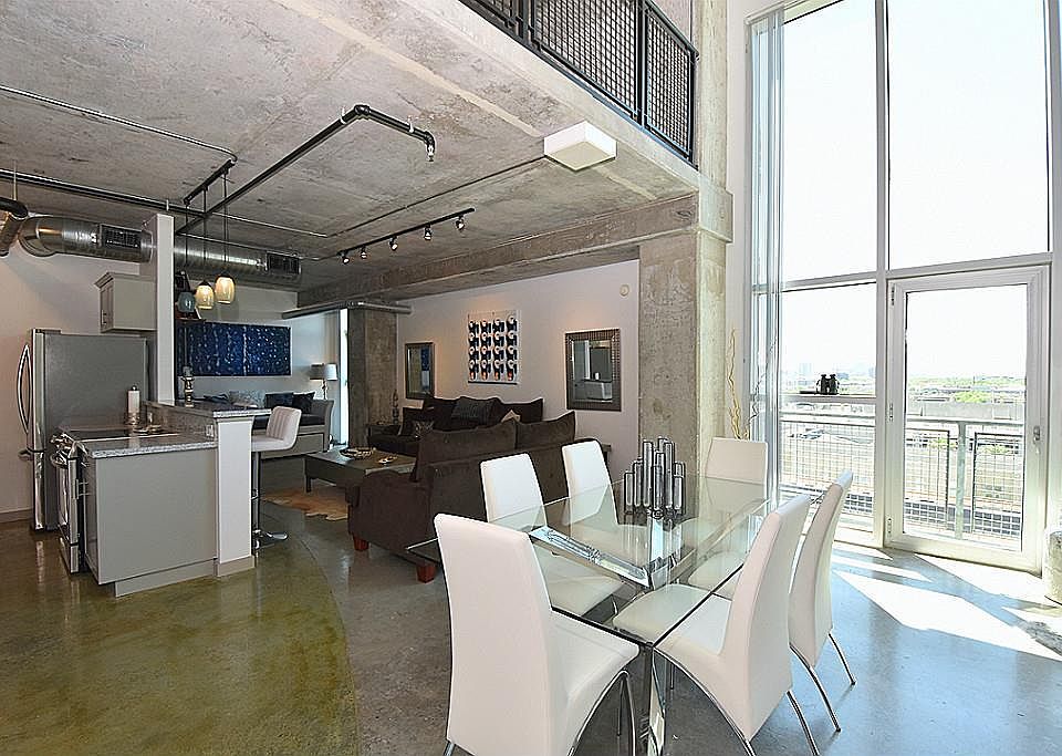 Impressive oversized, 2 story loft in the heart of vibrant Midtown! This unit has it all: amazing location, fabulous finishes, spacious rooms, lots of