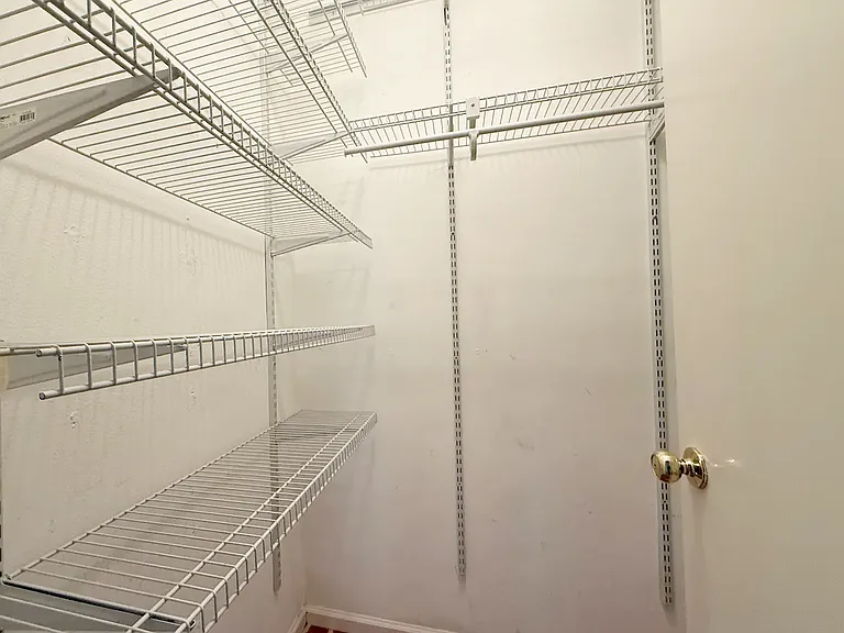 Closet in primary bedroom