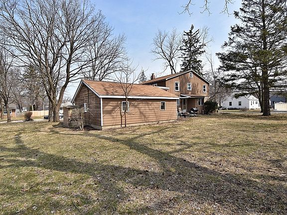 Back of house has Southern exposure. Double lot offers lots of outdoor living space!