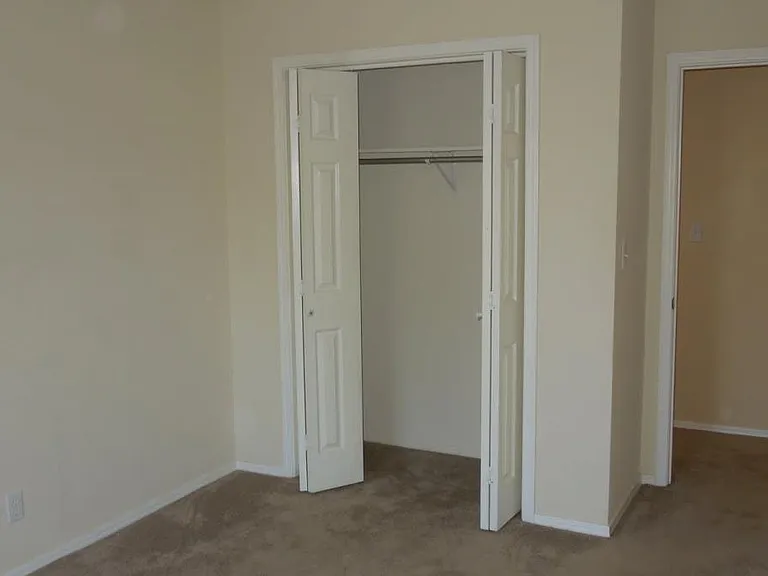 2nd & 3rd bedrooms, carpeted and ceiling fans.
