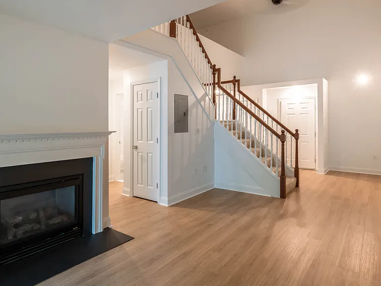 Living Room with Fireplace and Hard Surface Flooring
