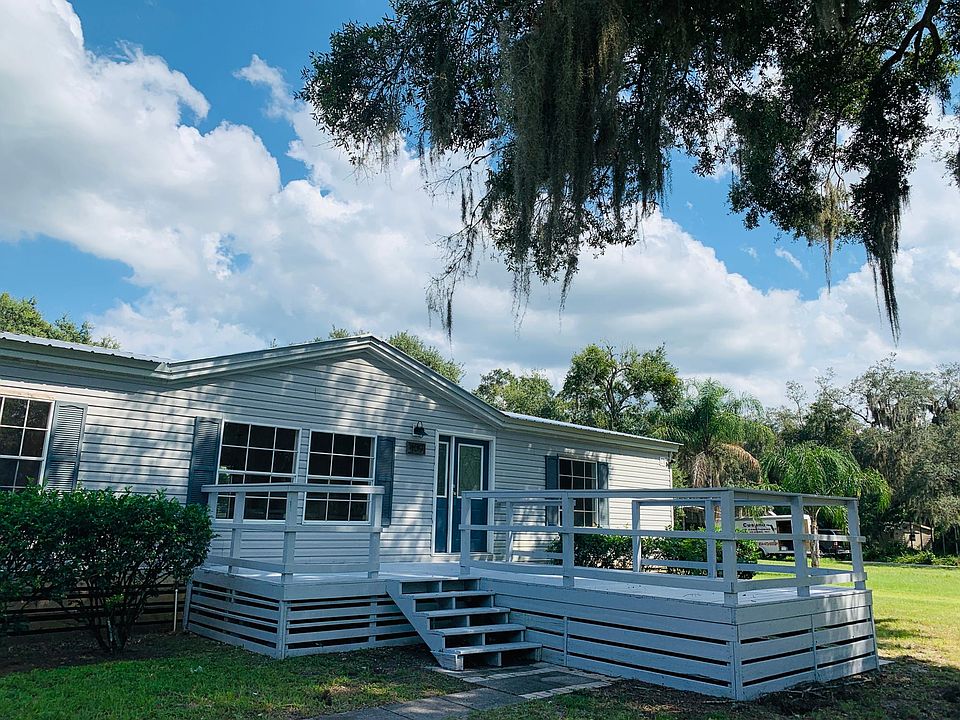 front of the home with huge Deck