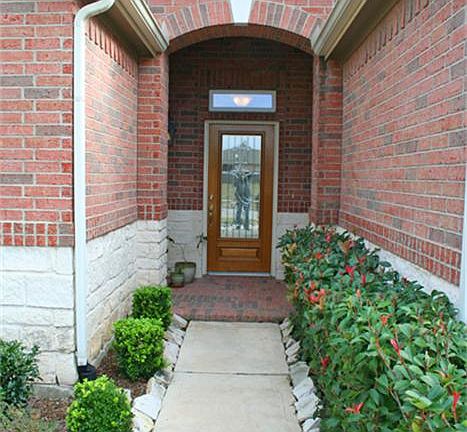Lovely entry to this lake front home is a preview to the beauty that is just inside the front door!