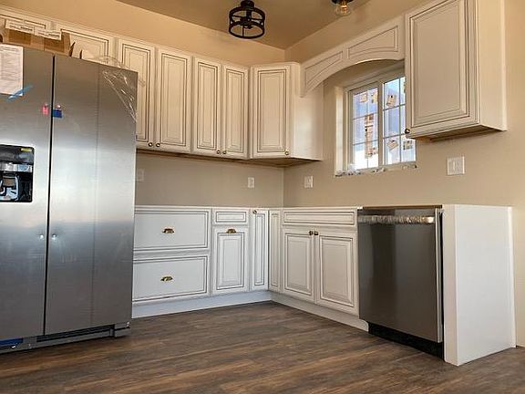 Full Kitchen, with one year use. Granite counter top, almost new dish washer, refrigerator and stove.