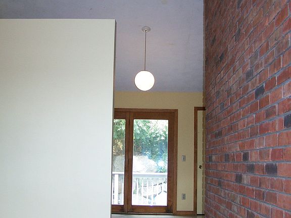 Living Room Opens to Large Eat-In Kitchen