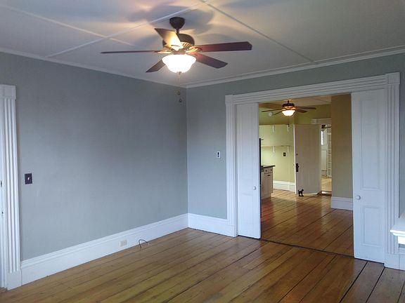 living room looking into kitchen/dining area