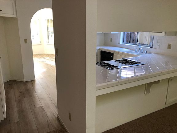 Looking through kitchen into dining room