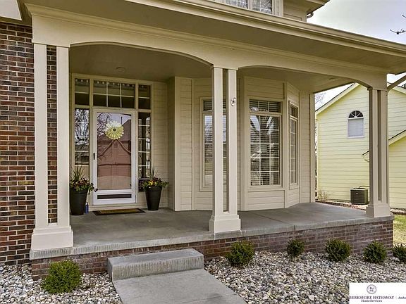 Classy front elevation with front porch.