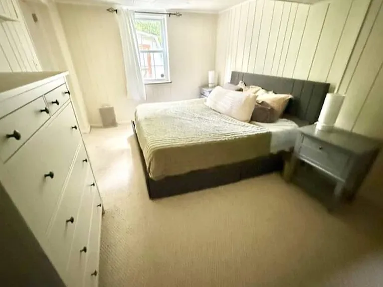 Third bedroom window looks straight into the fenced backyard and forest _ quiet, green, and no rear neighbors