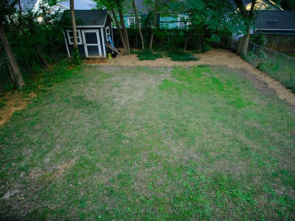 view of backyard and storage shed
