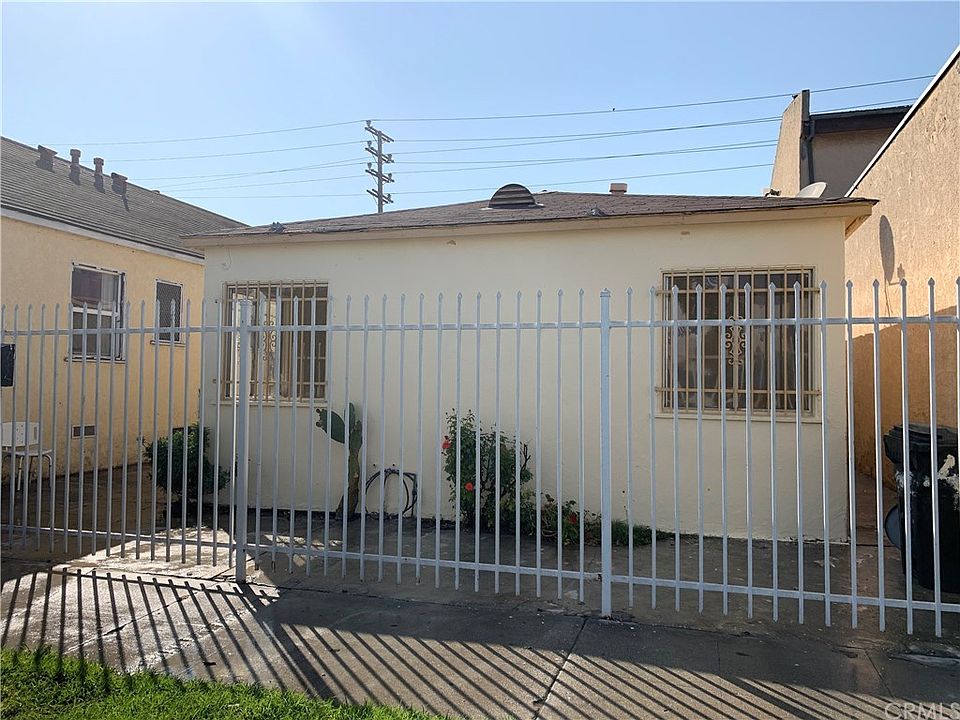 1st image of 9517 S San Pedro St