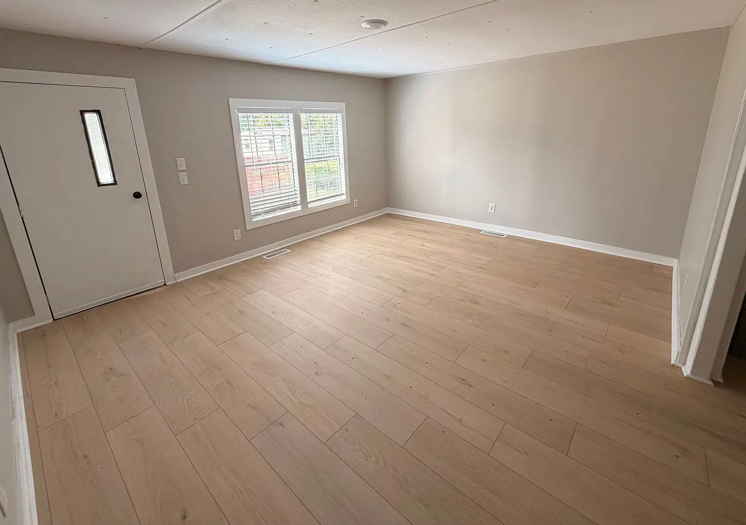 Spacious 4-Bedroom Home on a Private Wooded Lot with Screened Porch $1,900/Month — Photo 2