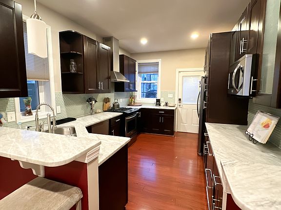 Kitchen with Range, and Wine Cooler