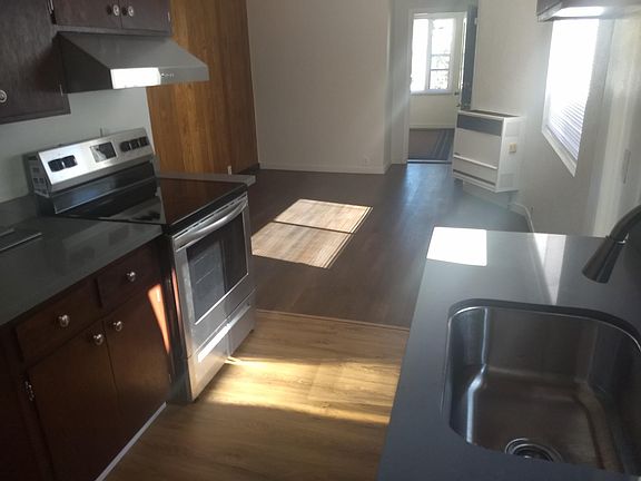 Kitchen towards living area and front bedroom