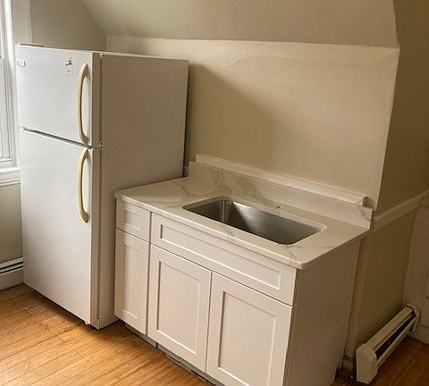 Kitchen refrigerator and sink