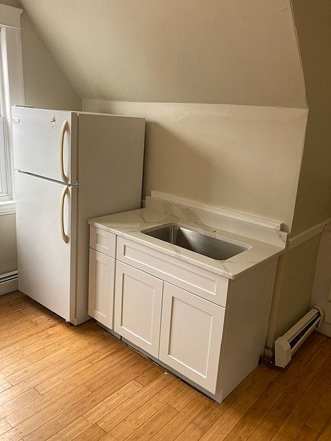 Kitchen refrigerator and sink