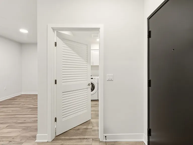 Laundry Room with Washer and Dryer Included