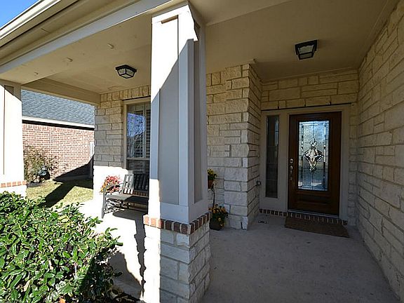 Front porch and doorway inviting you inside.
