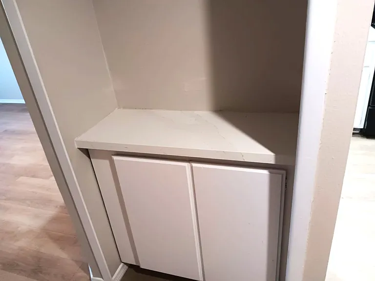 Hall cabinet with quartz countertop. Perfect for wet bar.