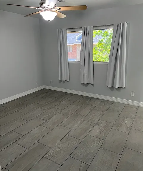 Second Floor Master Bedroom, Brand New Tile and Grout Flooring, New Baseboard Molding, New Curtains, Wall Sconce Lighting, Ceiling Fan with Light, Walk in Closet, 3/4 Master Bathroom with Shower.