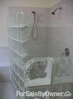 Master bathroom with walk-in shower.