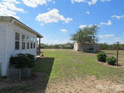 back of home and sunroom