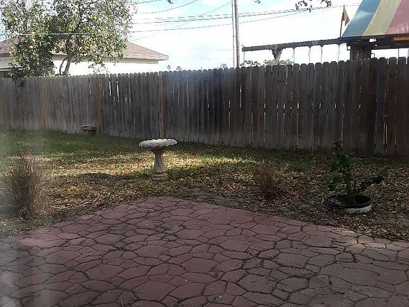 Shady private backyard with Patio.