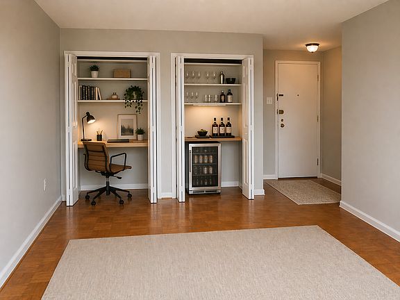 Closets in living room turned into study and mini bar