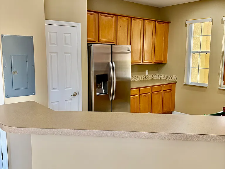 Kitchen overlooking the dining area and great room.
