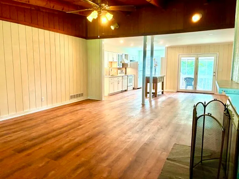 view of the Great Room from fireplace 

(NOTE- fireplace is currently not functional)