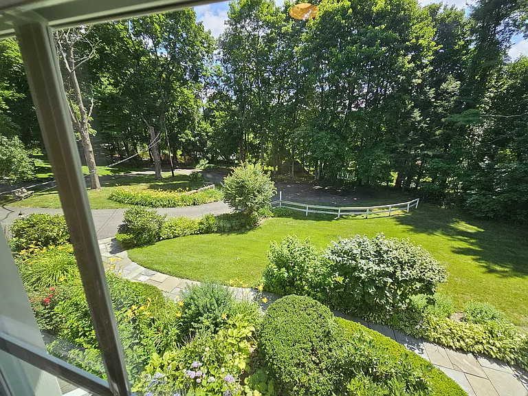 1st Floor Bedroom 2
View overlooking the front of the property and surrounding landscaping.