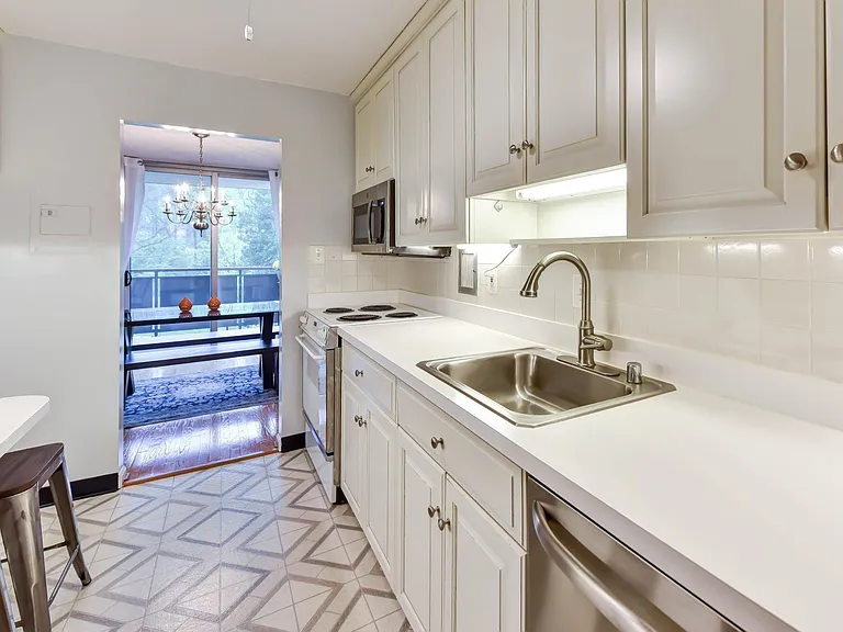 New stainless steel appliances (new stainless steel oven range installed after photo was taken).