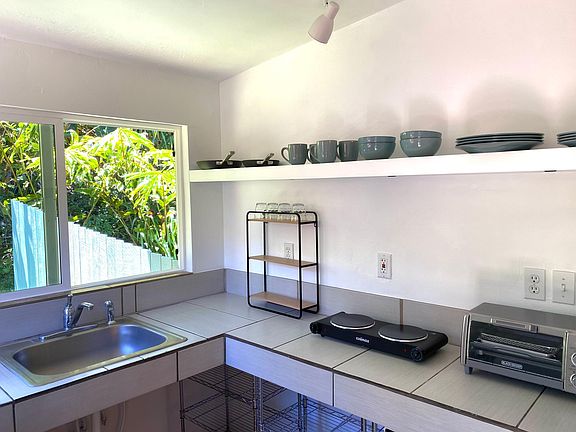 kitchen with a beautiful jungle view