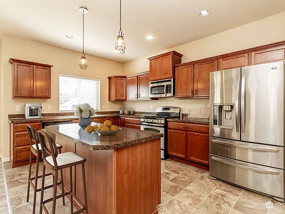 4th image of 10369 Solstice Avenue NW