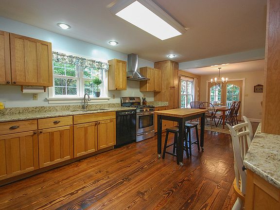 Recently updated kitchen
						:
						Large farmhouse kitchen with modern touches. New granite, gas range, hood.