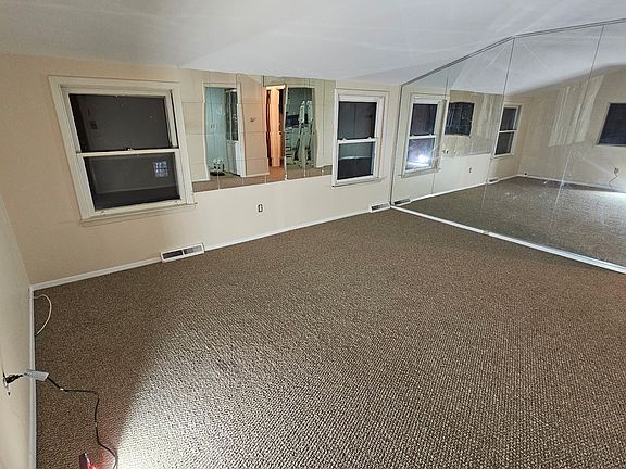 Living Room features mirror-wall
